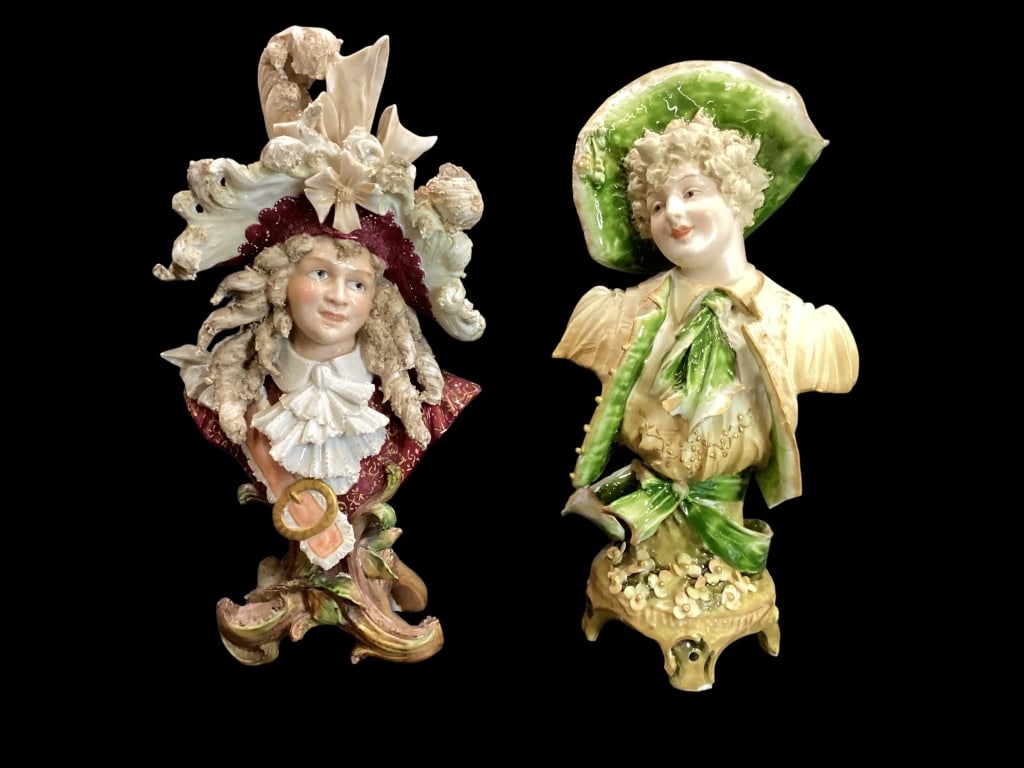 Two Decorative Porcelain Busts: Turn Wein Austrian Bust of young maiden with green hat and ribbons, 10 inches tall. A ornate bust attributed to Sitzendorf, 10 inches tall, elaborate curls, hat and costume - ()
