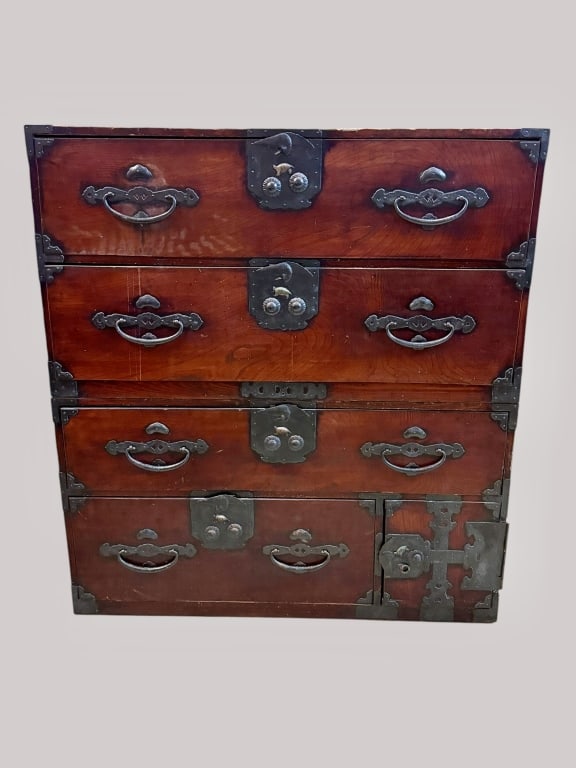 Antique Japanese Tansu Chest: Late 19th/early 20th century, stacking chest with wrought iron handles and elements, rich reddish-brown finish, lock plates with crane and title motifs..age related wear and finish loss, shrinkage