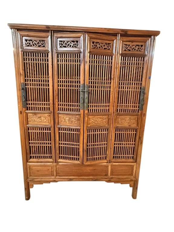 Antique Chinese Lattice Kitchen Wedding Armoire: Exceptional antique 19th-century Chinese kitchen or wedding armoire cabinet crafted from solid elm wood (Yumu) with a warm natural finish. This beautifully ventilated piece features intricate open