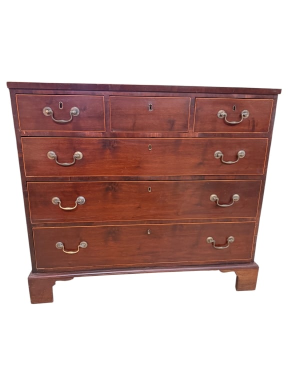 Antique 19thC Chippendale Mahogany Inlay Chest: Antique 19th-century British Chippendale period chest of drawers in mahogany with elegant contrasting lightwood string inlay borders. Features a top row of three short drawers over three long