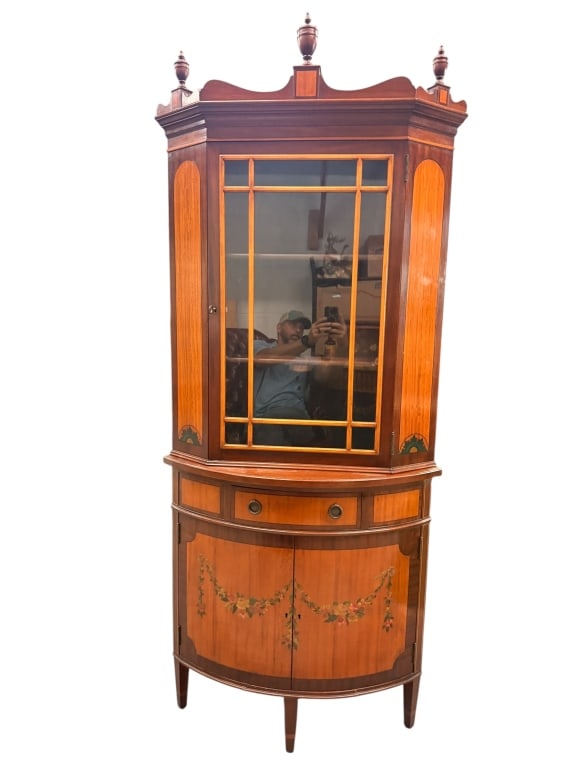 1931 Charak Furniture Co. Corner China Cabinet: Fine vintage Federal style corner china cabinet handmade by the Charak Furniture Co. of Boston, Massachusetts. The upper section features a single glass door with geometric wood mullions, flanked by