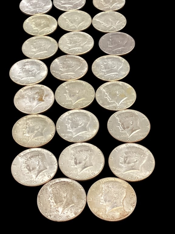 Twenty Three Kennedy Half Dollar Coins: 17 dated 1967, 4 dated 1969, 1 each 65, and 69. All circulated with rubbing wear - ()