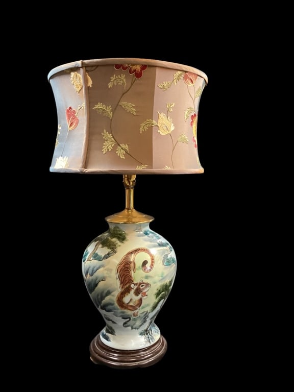 Famille Porcelain Vase Lamp: Famille Porcelain Vase Lamp Chinese porcelain lamp, hand painted with scene depicting a tiger and pine tree. The classic symbol of courage and strength. Finely detailed. 14 inches vase mounted as a la