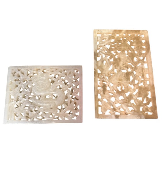 Two Chinese Carved Jade Openwork Plaques: Two Chinese Carved Jade Openwork Plaques Plaque 1 (Dragon): Crafted from a pale celadon-to-white jade stone, intricately pierce-carved with a central sinuous dragon amidst a dense ground of scrolling 