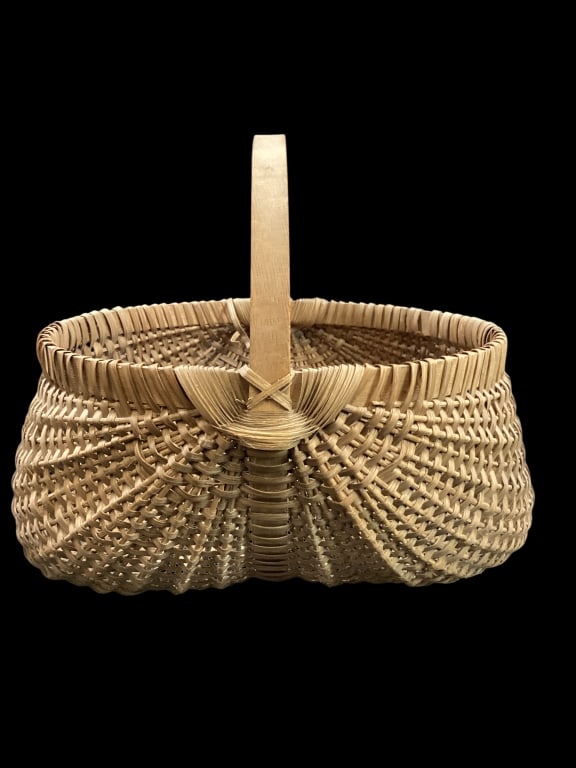 Large Hand Crafted Gathering Badket: Large Hand Crafted Gathering Badket Woven rib and splint design with eye of God handles, on bentwood frame, wrapped rim. 17 inches oval wash diameter