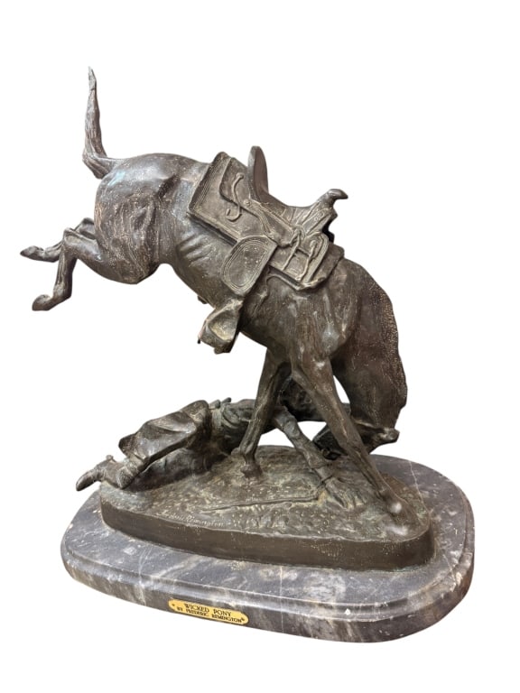 After Frederic Remington Wicked Pony Bronze: After Frederic Remington Wicked Pony Bronze A patinated cast bronze Western sculpture titled "Wicked Pony", after the celebrated 1898 original by Frederic Remington (American, 1861–1909). The dyn