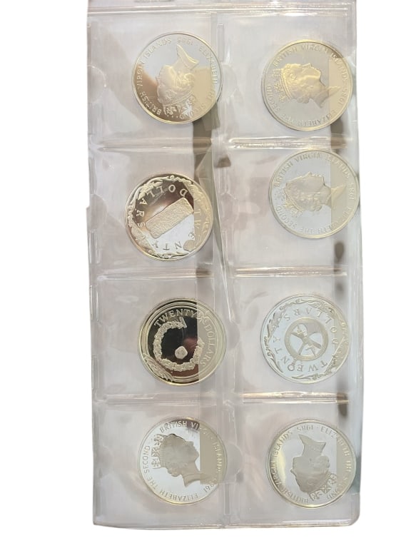 8 BVI Queen Elizabeth II Twenty Dollar Coins: 8 BVI Queen Elizabeth II Twenty Dollar Coins Eight legal tender Twenty Dollar proof coins issued for the British Virgin Islands in 1985. Composed of sterling silver, these brilliant coins feature the