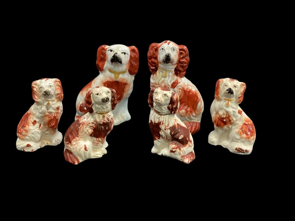Small English Staffordshire Spaniels: Six pieces, pair at 4 inches, right and left facing, rust red coloring, pair at 3.5 inches tall with also right and left facing, dark rust with feathering gilt collars, two single dogs at 5 and 5.5