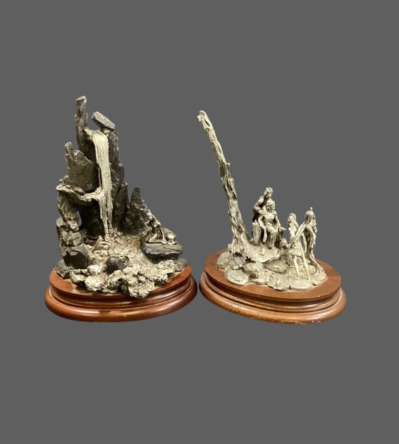 Two Fine Pewter Sculptures: Cool Waters by Francis Barnum for Chilmark, it depicts a Native American maiden seated on a rock beside waterfall. Dated 1987. Tecumsehs War, created by Donald Jack Pollard, depicts a group of Native
