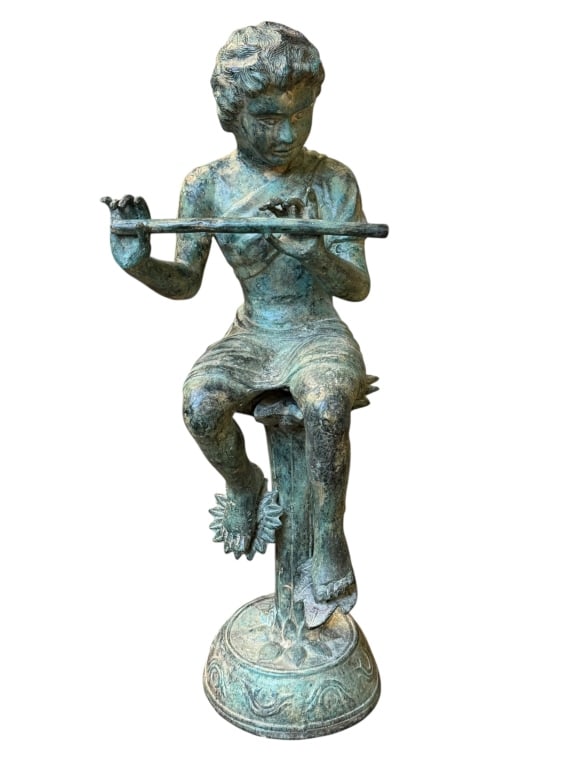Bronze Fountain Statue of Child with Flute: A cast bronze figure of a seated youth playing a flute, perched on a fluted pedestal above a scalloped basin base, with a rich patina throughout. Likely 20th century, garden fountain manufacture, in