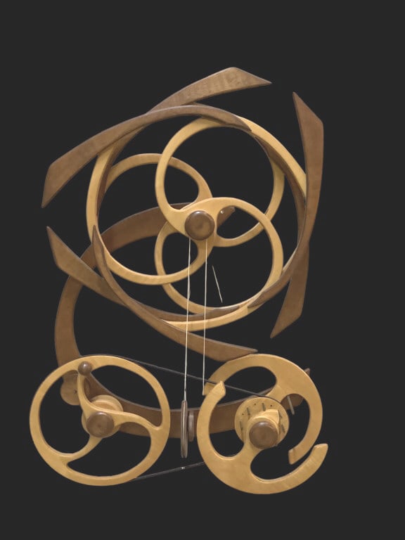 Sky Quest Kinetic Wall Sculpture: Attribution to artist David Roy, this unusual piece is driven by a spring mechanism with the lower wheels counter rotate to animate the upper spiral. Mixed light and dark hardwood. 28 x 22 inches