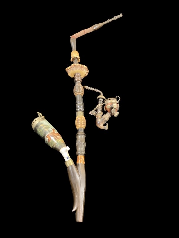Two German Modular Pipes: European long hunting pipe, with traditional painted bowl, with stag, multi part stem with ribbed sections, stag horn element, long flexible stem. 5 inch pipe crafted from polished briar wood with a