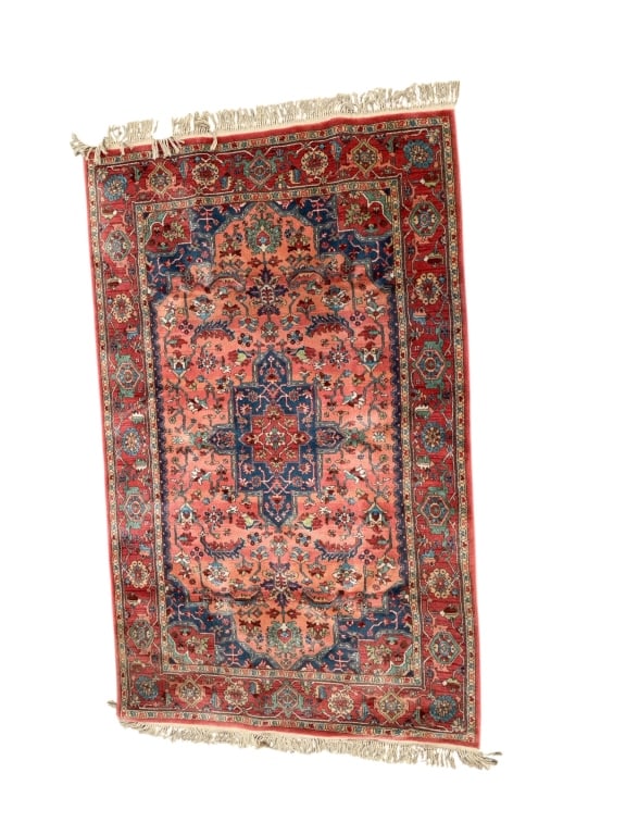 Persian Style Wool Area Rug: Vintage Persian-style wool area rug featuring a traditional Heriz or Serapi-inspired medallion design in rich tones of red, blue, and salmon. Bold geometric motifs and intricate floral detailing creat