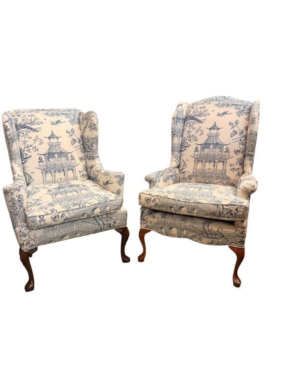 Pair of Queen Anne-Style Wingback Chairs: Near pair, White Chinoiserie Toile fabric , Queen Anne-style wingback chairs, beautifully upholstered in a striking blue-and-white pagoda toile depicting Chinese garden scenes ? pavilions, arched