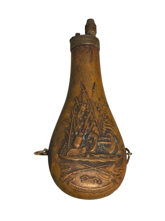 Civil War Era Copper Colt Powder Horn: Civil war era copper colt powder horn with embossed image of stand of arms motif, and text reading "Colt. S Patent". Item is in good condition with some wear.