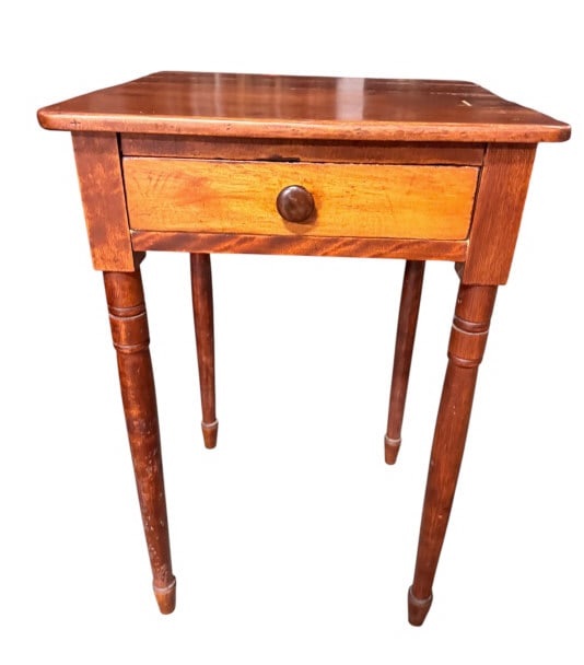 Sheraton-Style One-Drawer Work Table: Cherry and Maple Early American Sheraton-style one-drawer stand in cherry/mahogany-toned wood, single dovetailed drawer with turned wood knob, rounded-corner top, and tall ring-turned tapering legs