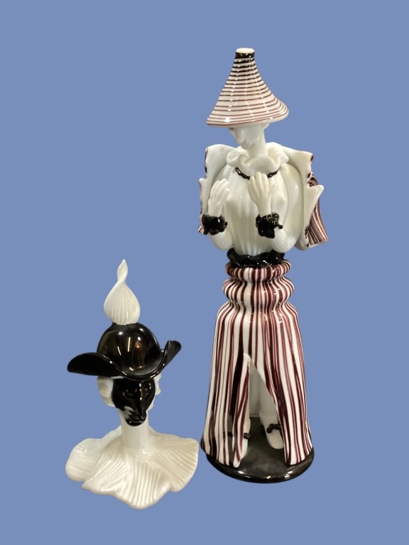 Venini Murano Art Glass Figures: Tall blown glass figure from Tiepolo series designed by Fulvio Bianconi , early 1950?s, with characteristic striped design black and white trimmed opaline glass. Signed. With a masked head figure wear