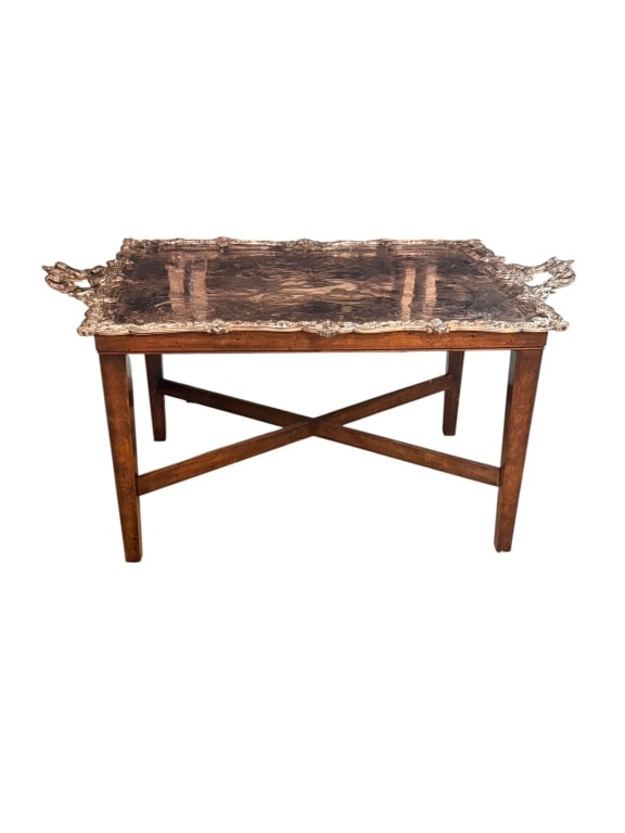 Silverplate Tray-Top Table with Griffin Handles: Silverplate tray-top table, the shaped rectangular tray with dense engraved rococo scroll and floral decoration, cast figural dolphin/griffin handles at each corner, gadrooned and shell-cast rim.