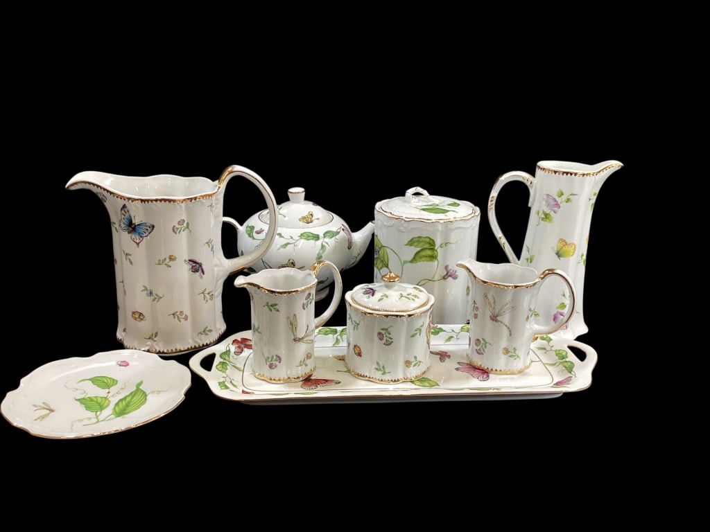 Godinger Porcelain Articles: Primavera Collection of 9 pieces to include: 15 inches tall tray, biscuit jar, teapot, pitcher, 2 cream pitchers, covered sugar, small plate. All stamped for Godinger