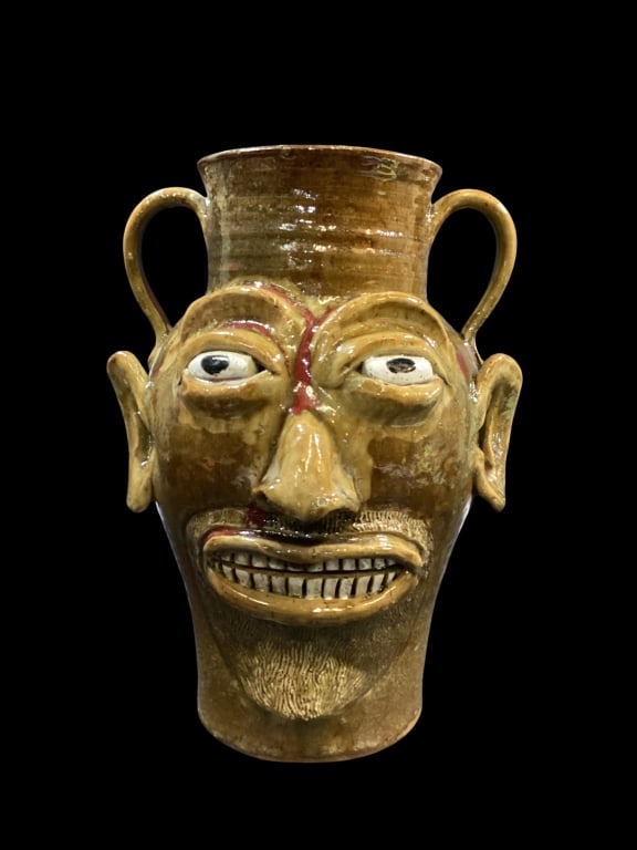 Folk Art Pottery Face Jug Vase: Southern Stoneware large face vase by Artist Marvin Bailey. Large 16 inches tall with tall vase with defined features, double row chip teeth, big nose, elongated ears, bug eyes. Rich tobacco spit