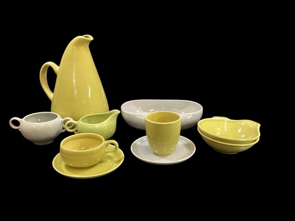 Russel Wright Mid Century China: American Modern, Partial set of 81 pieces, including dynamic chartreuse and gray color palette. Includes plates, bowls, cup, small plates, tall pitcher, cream, sugar, serving bowls tumblers. Line Item
