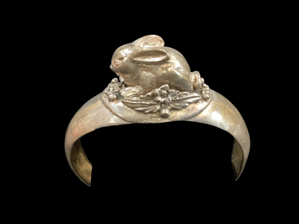 Sterling Silver Cuff Bracelet: Vintage Sterling cuff bracelet with a whimsical rabbit surrounded by leafy foliage. Attributed to early Mexican Artists but unmarked except for 925. ( 1.20 ozt )