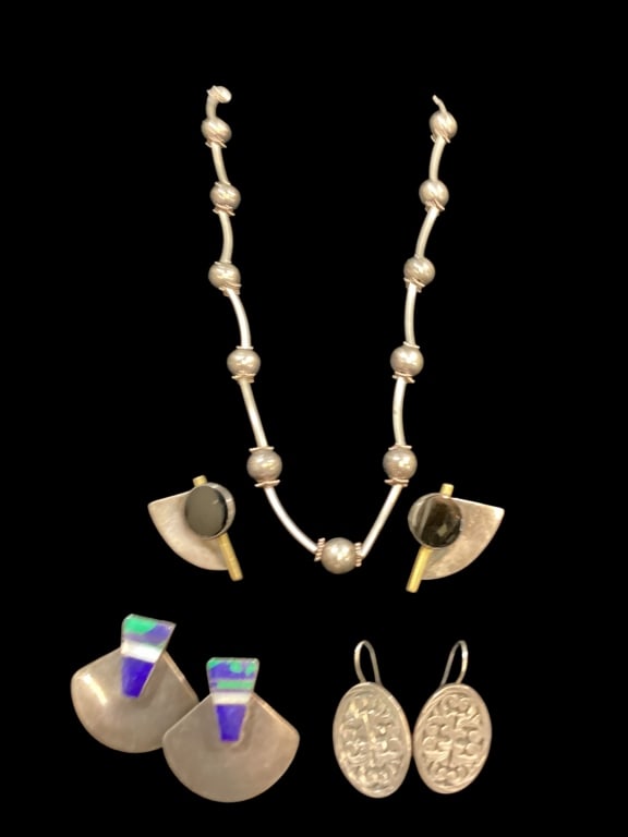 Sterling Necklace and Earrings: Vintage Sterling Bead and Bar 20 inch necklace, pair multi stone inlay Sterling fan earrings, pair half circle post earrings with black onyx stones, pair intricate dangling scrollwork earrings.