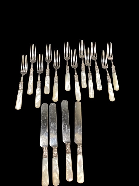 Mother of Pearl and Sterling Flatwear: 16 pieces to include 12 forks and 4 knives, pearl handles with Sterling banding