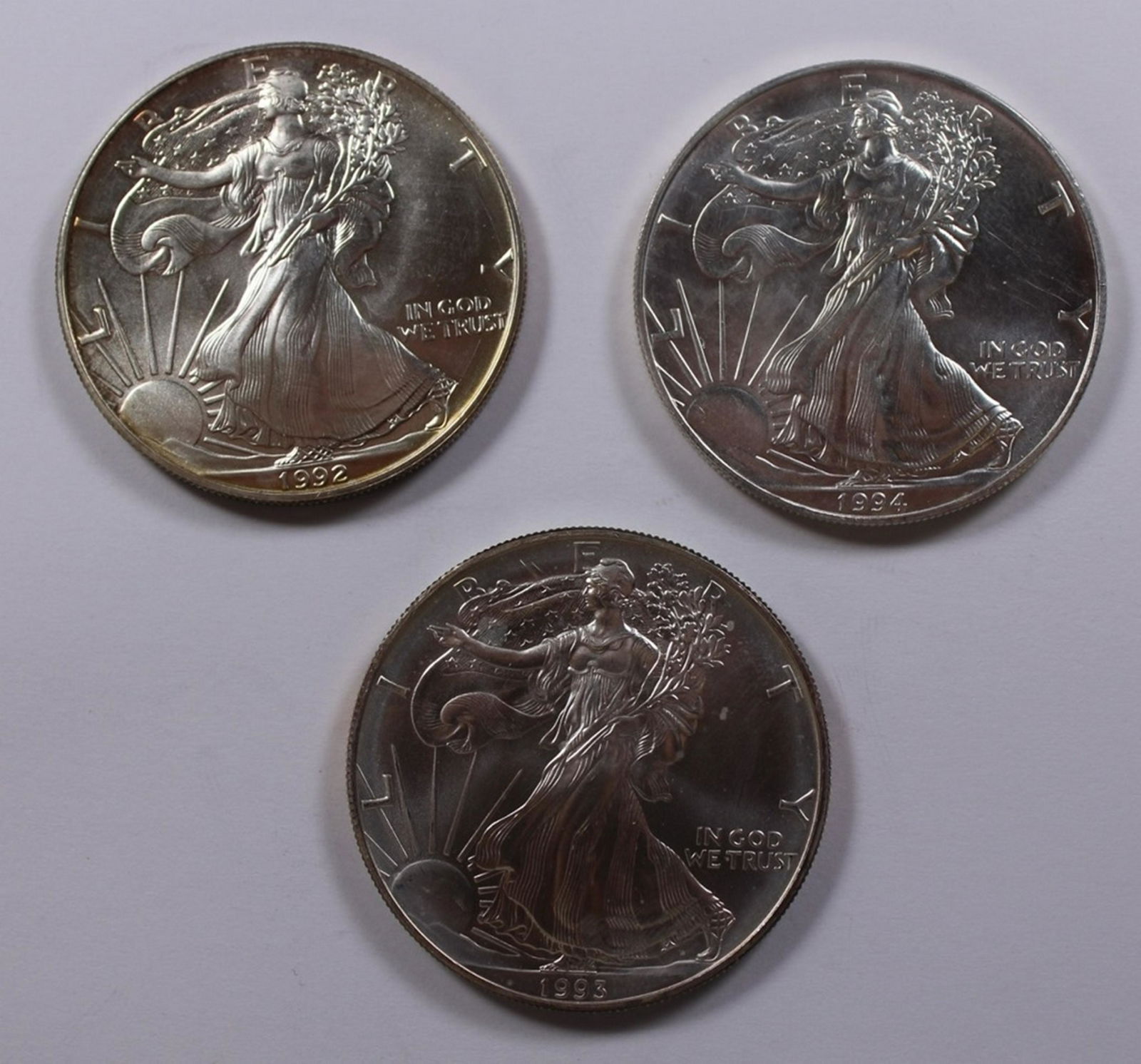 THREE AMERICAN SILVER EAGLES (1 of 2)