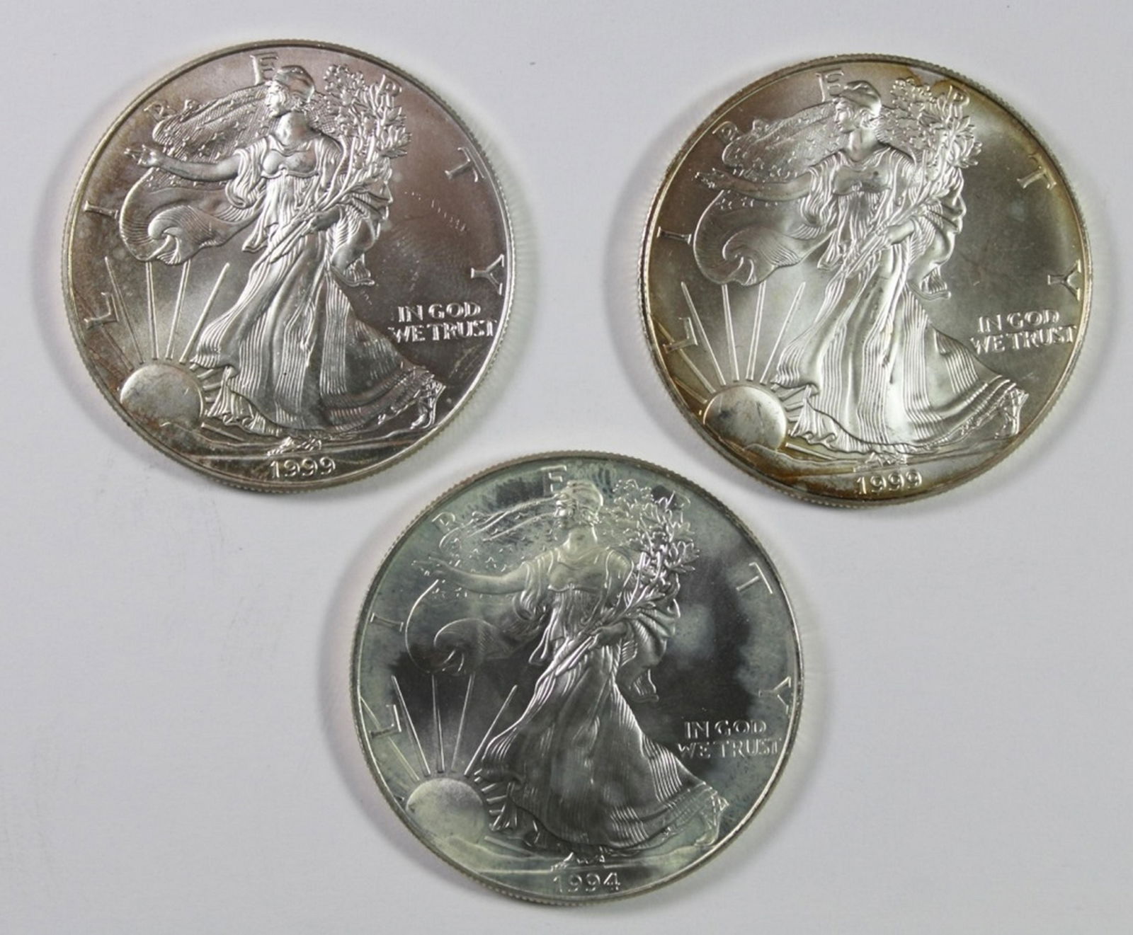 THREE GEM BU AMERICAN SILVER EAGLES (1 of 2)