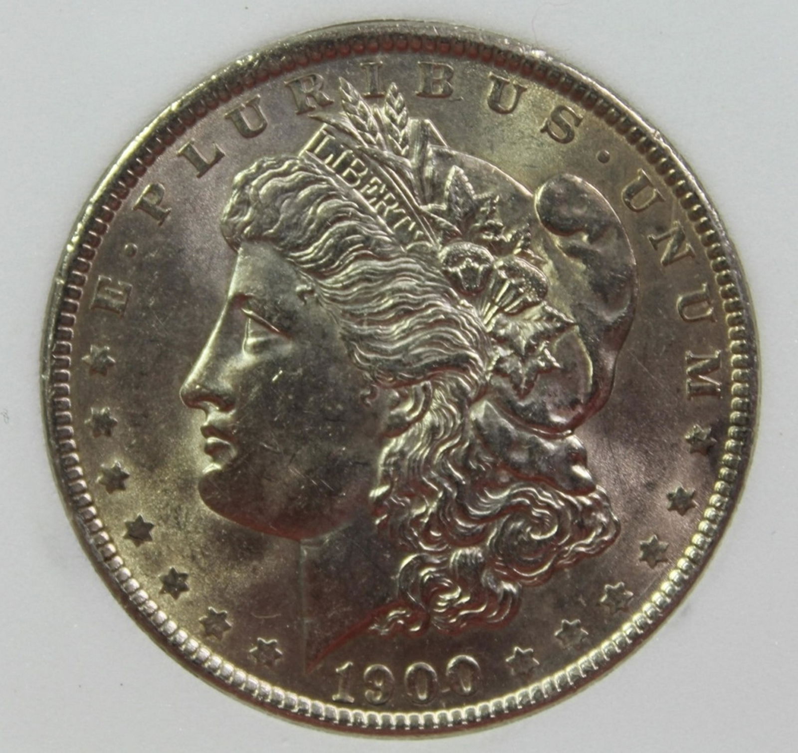 1900 MORGAN SILVER DOLLAR (1 of 4)