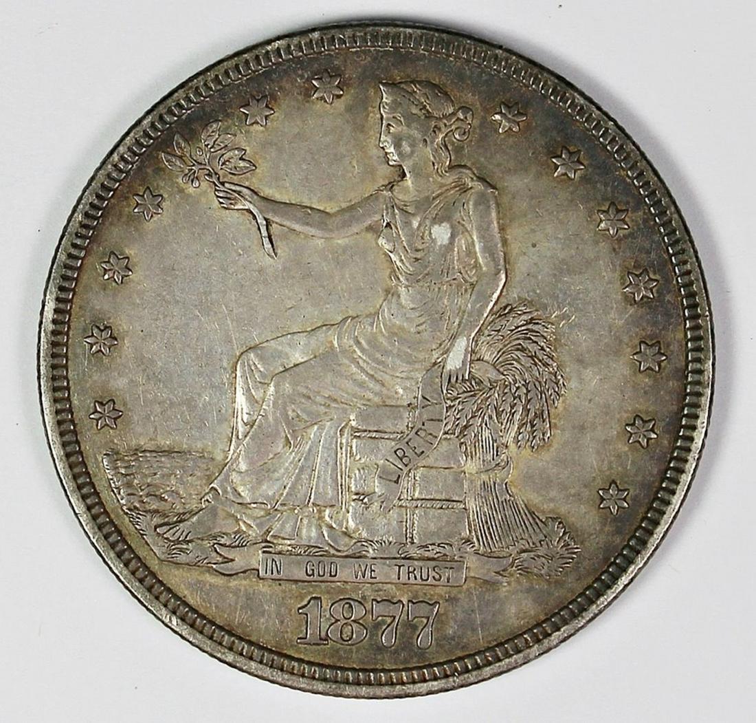 1877 TRADE DOLLAR (1 of 2)