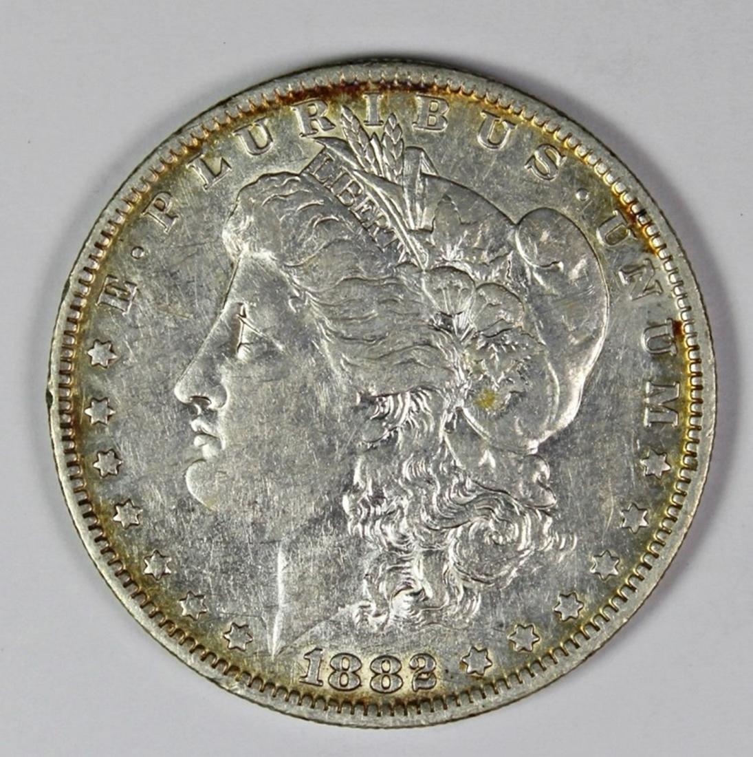 1882-O/S MORGAN SILVER DOLLAR (1 of 2)