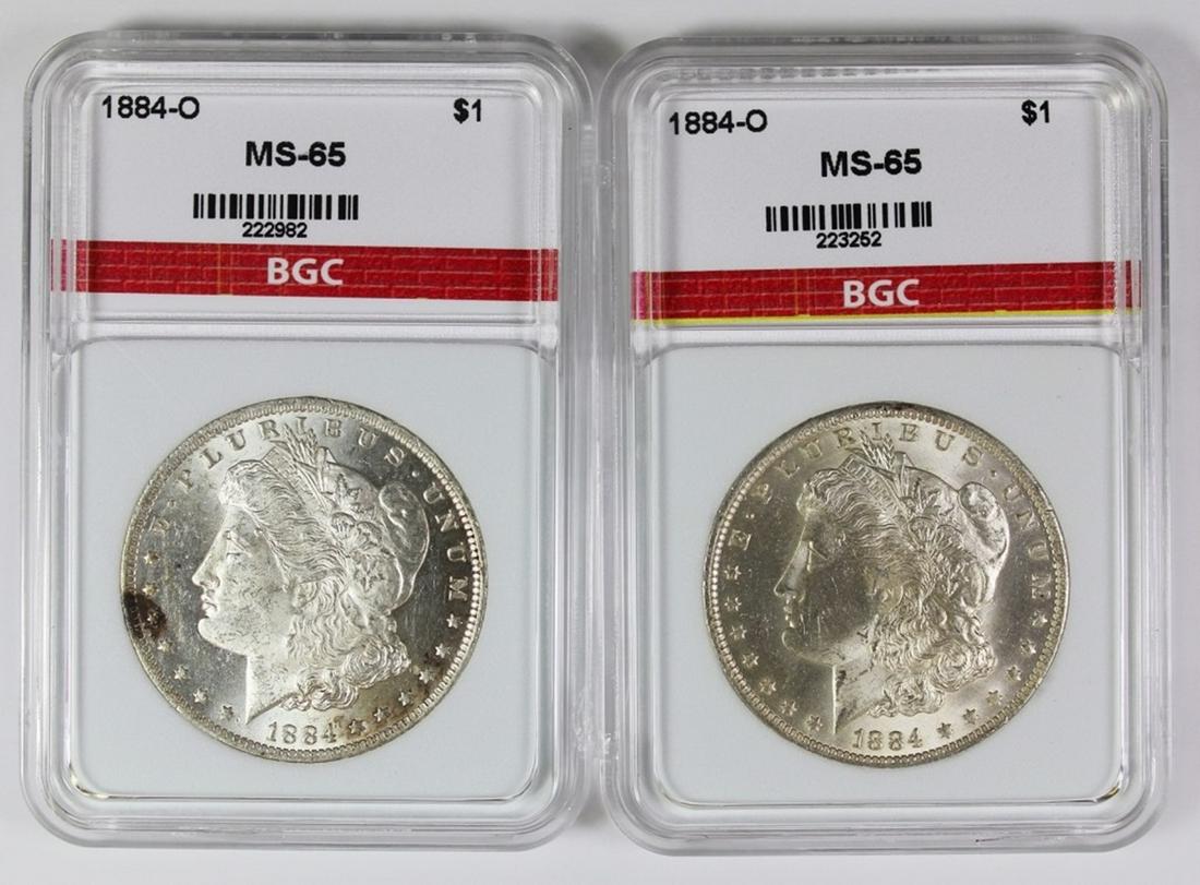 (2) 1884-O MORGAN SILVER DOLLARS (1 of 2)