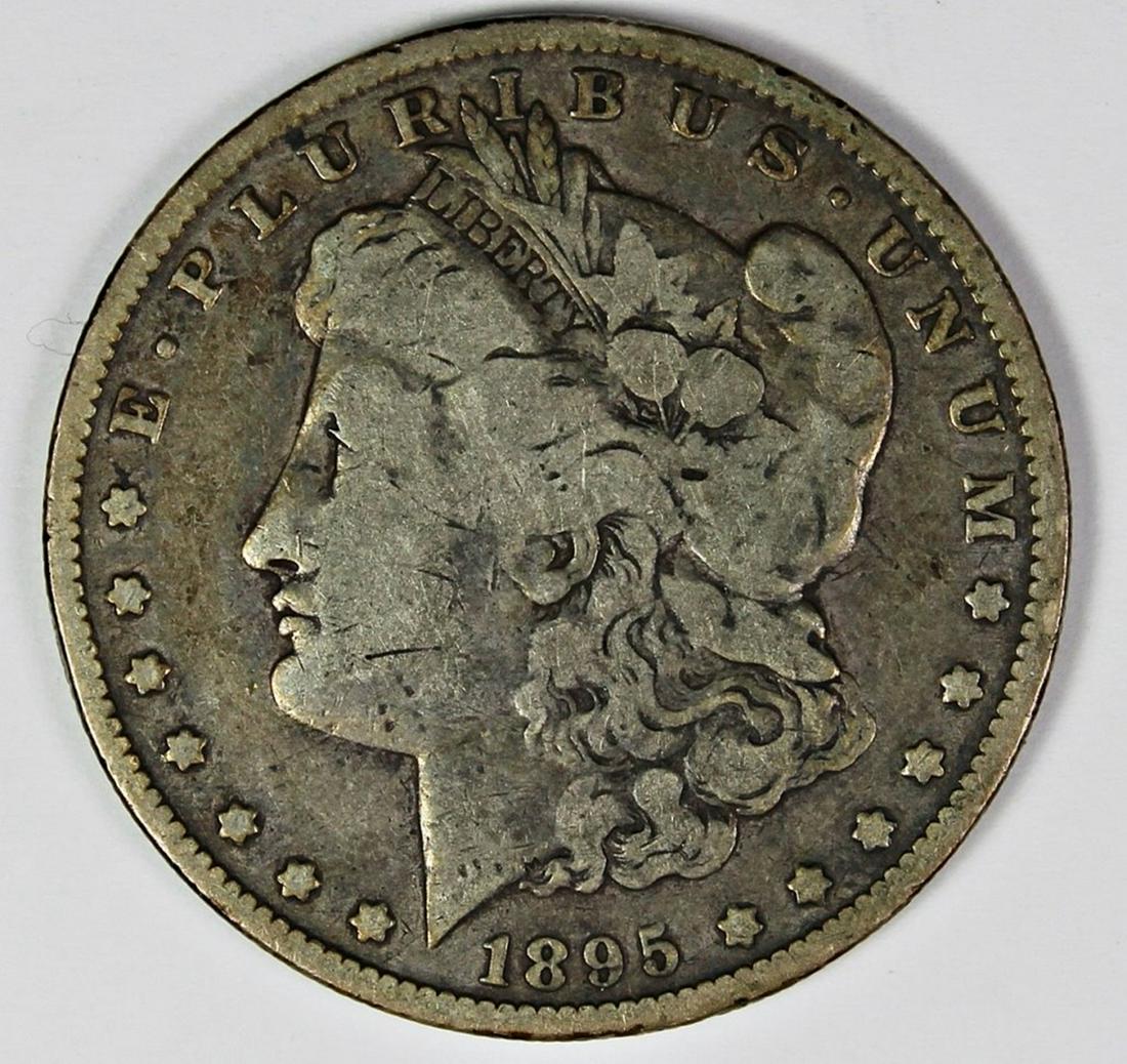 1895-O MORGAN SILVER DOLLAR: FINE. KEY COIN. ESTIMATE: $275-$325