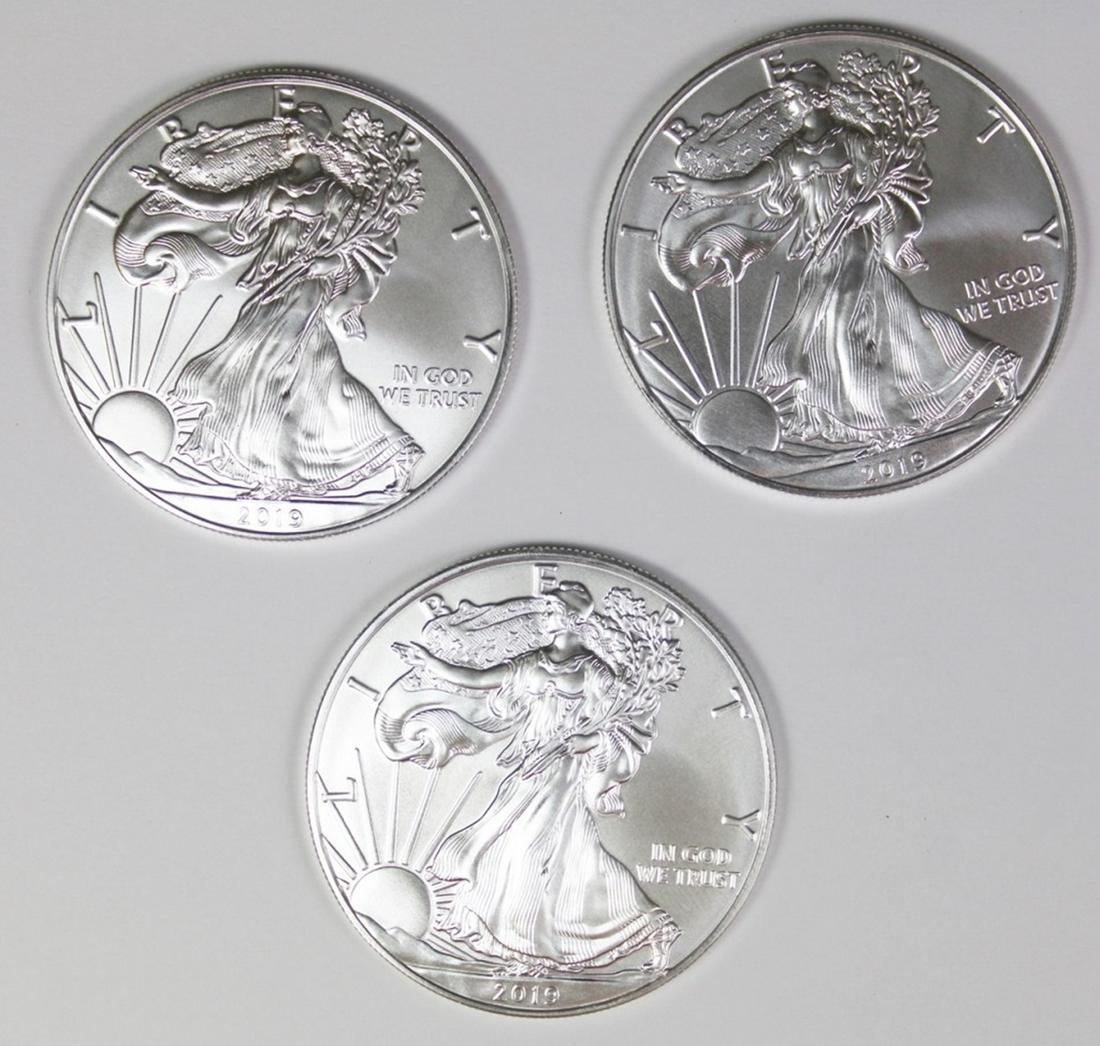 THREE 2019 AMERICAN SILVER EAGLES (1 of 2)