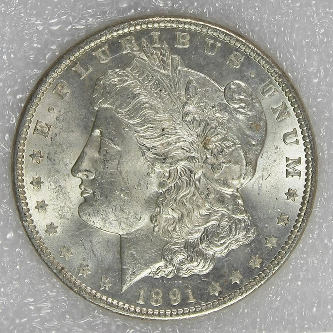 1891 MORGAN SILVER DOLLAR: PNA GRADED. MS64 BLAST WHITE. ESTIMATE: $600-$650