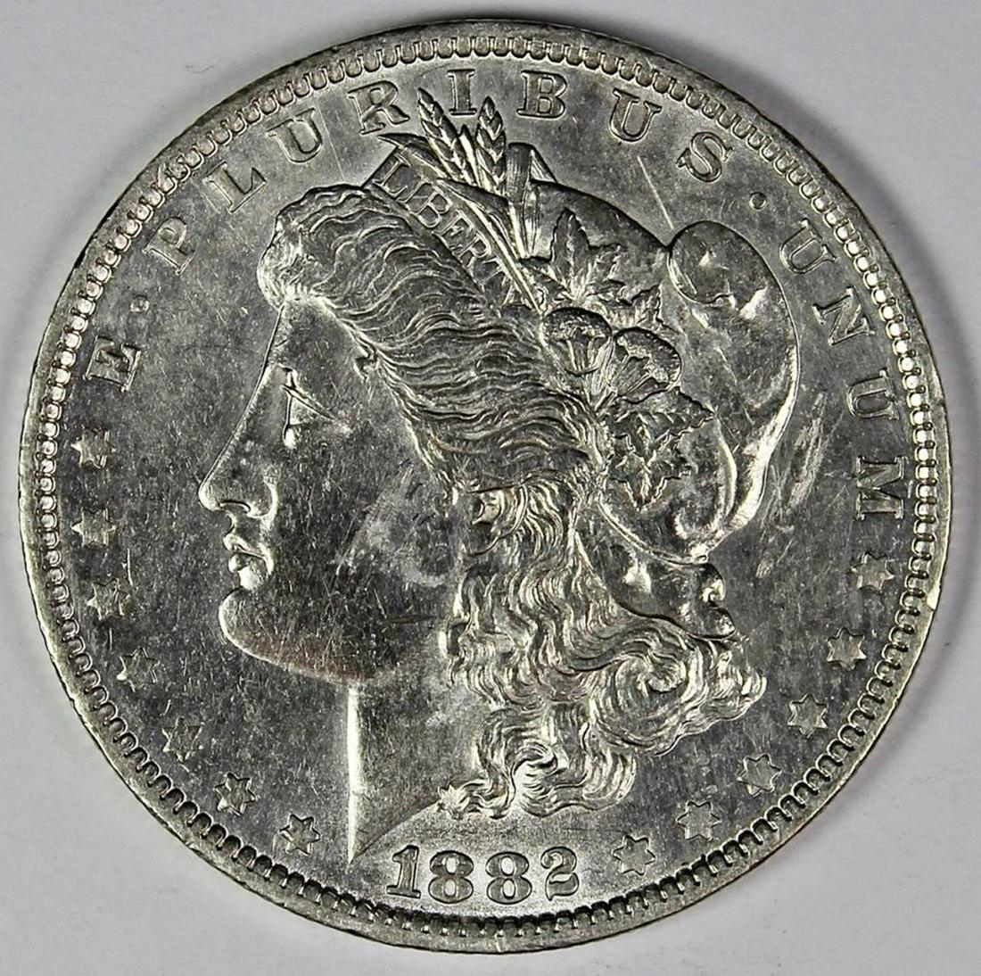 1882-O/S MORGAN SILVER DOLLAR (1 of 2)