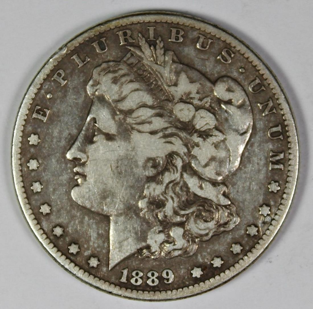 1889-CC MORGAN SILVER DOLLAR (1 of 2)