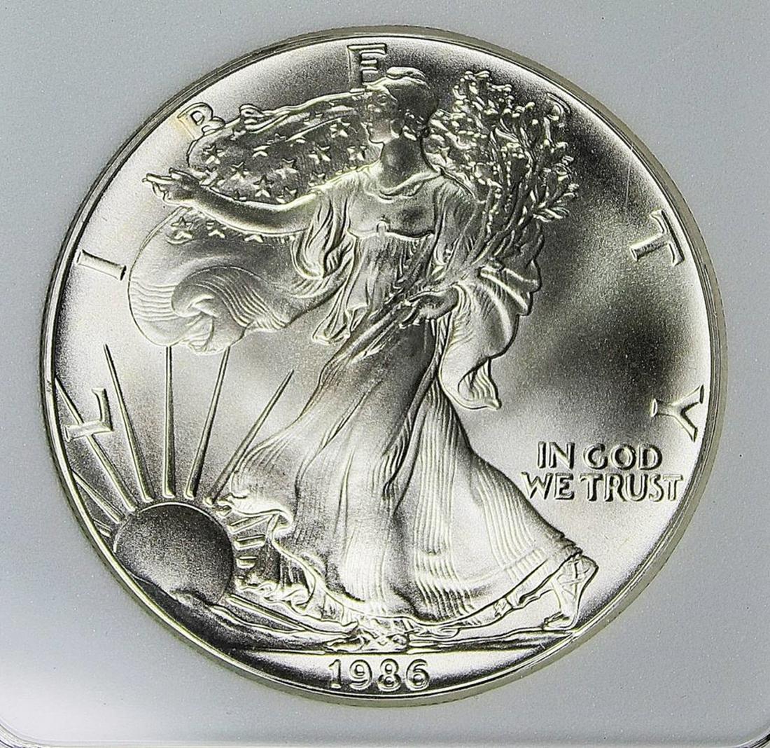 1986 AMERICAN SILVER EAGLE: RNG GRADED. MS70 RARE! ESTIMATE: $1,150-$1,300