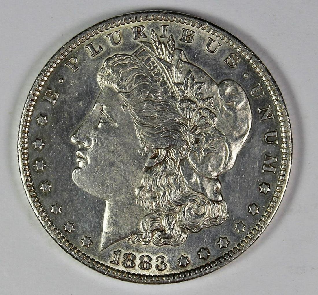 1883-O MORGAN SILVER DOLLAR (1 of 2)