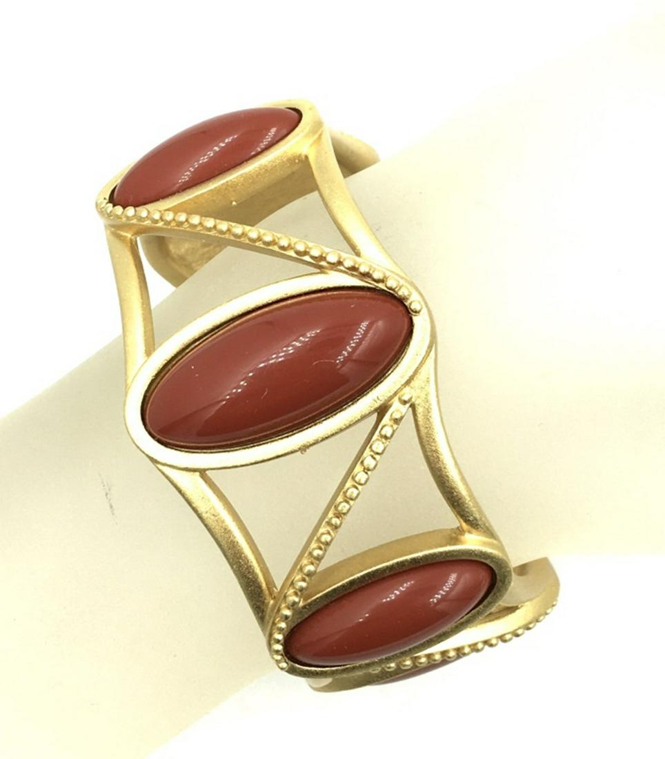 MONET CUFF BRACELET GOLD TONE: RUST COLOR STONES, ESTIMATE: $1-$100