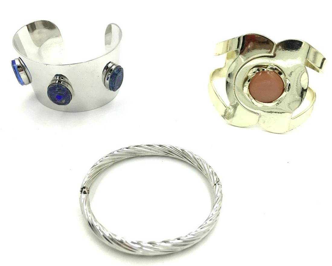 LOT OF THREE VINTAGE CUFF BRACELETS: TWO UNSIGNED, CUFF WITH BLUE STONES IS SARA COV. ESTIMATE: $1-$100