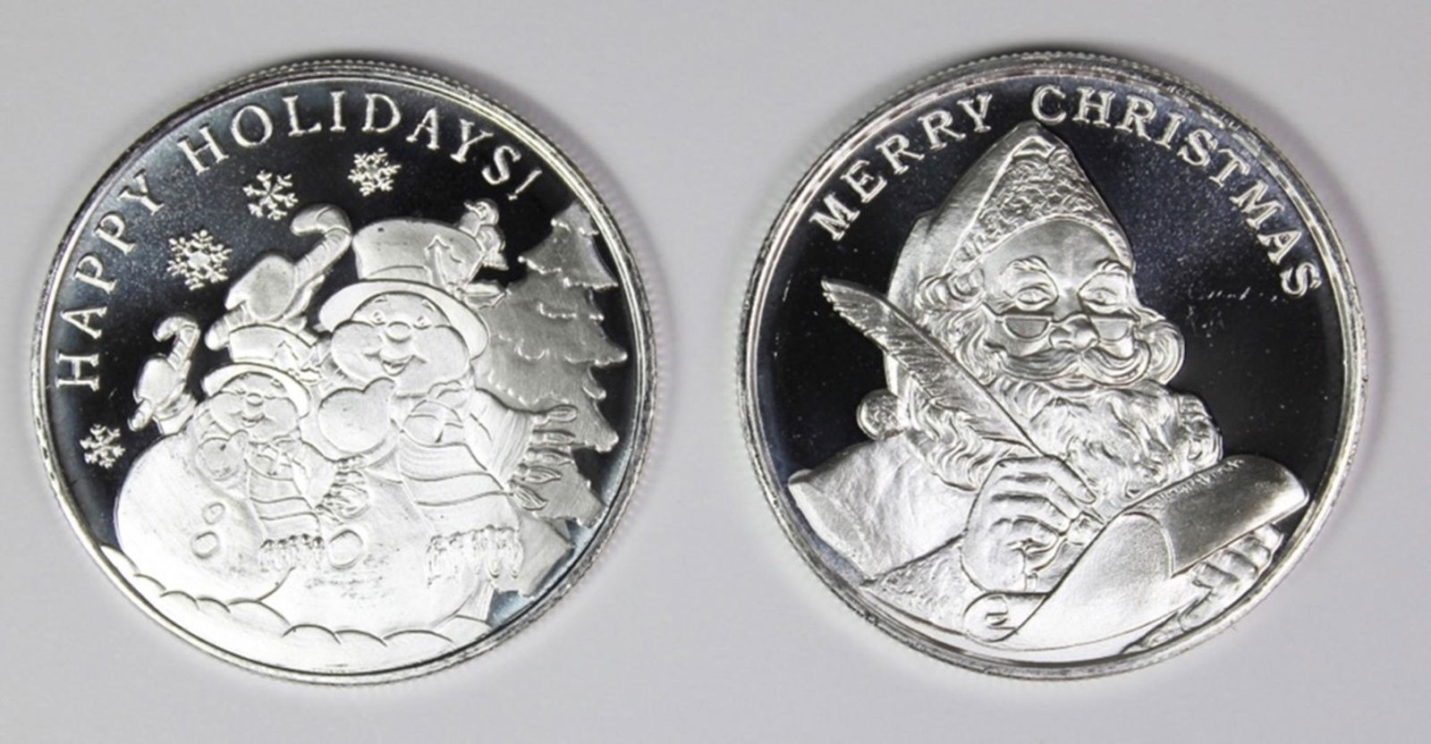 (2) DIFFERENT 2019 CHRISTMAS SILVER ROUNDS (1 of 2)
