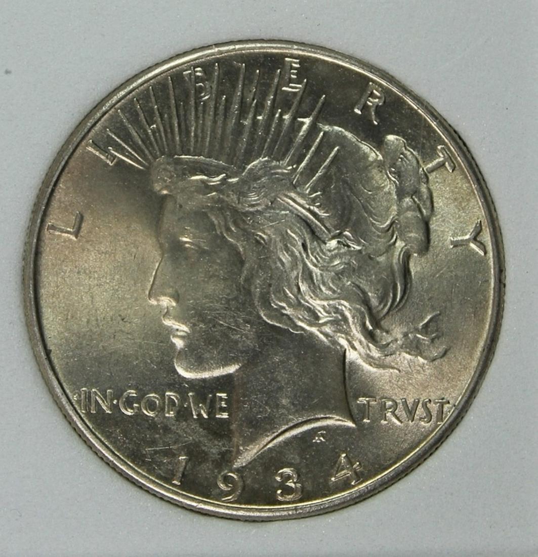 1934 PEACE SILVER DOLLAR (1 of 4)