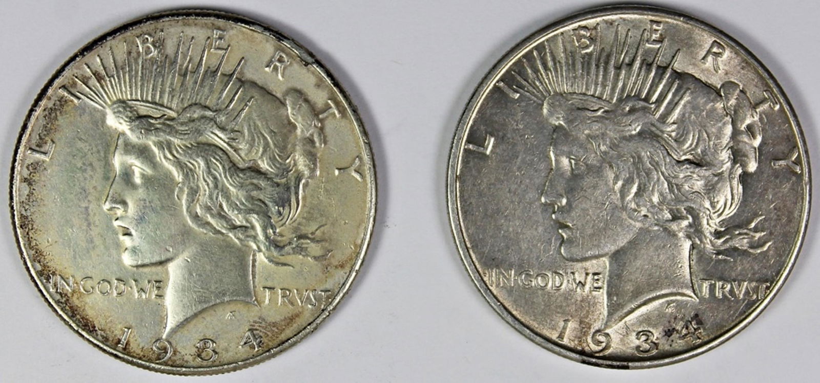 TWO PEACE DOLLARS: (1 of 2)
