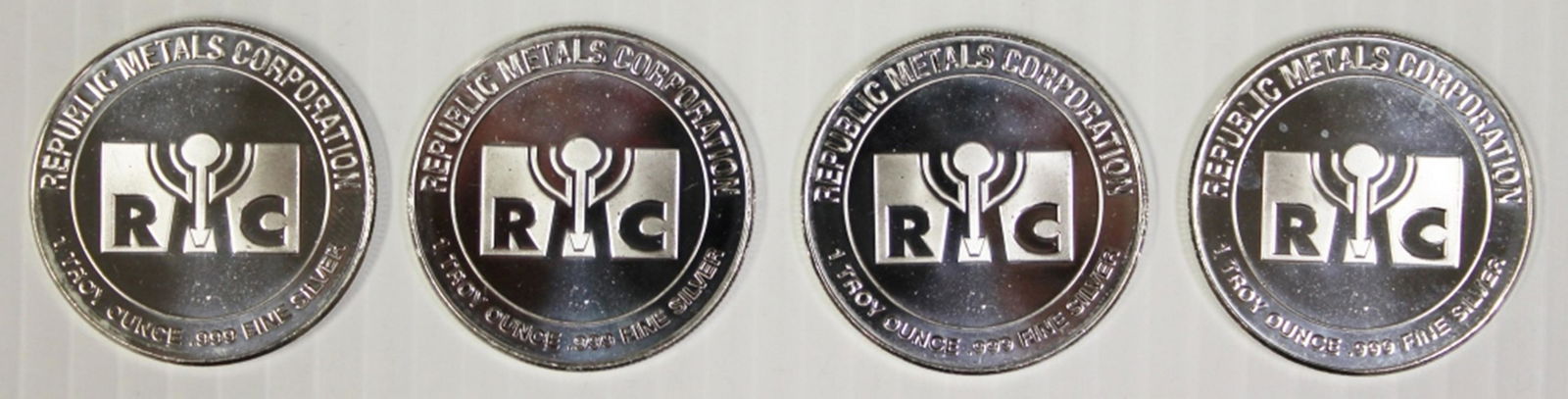 FOUR SILVER ROUNDS (1 of 2)