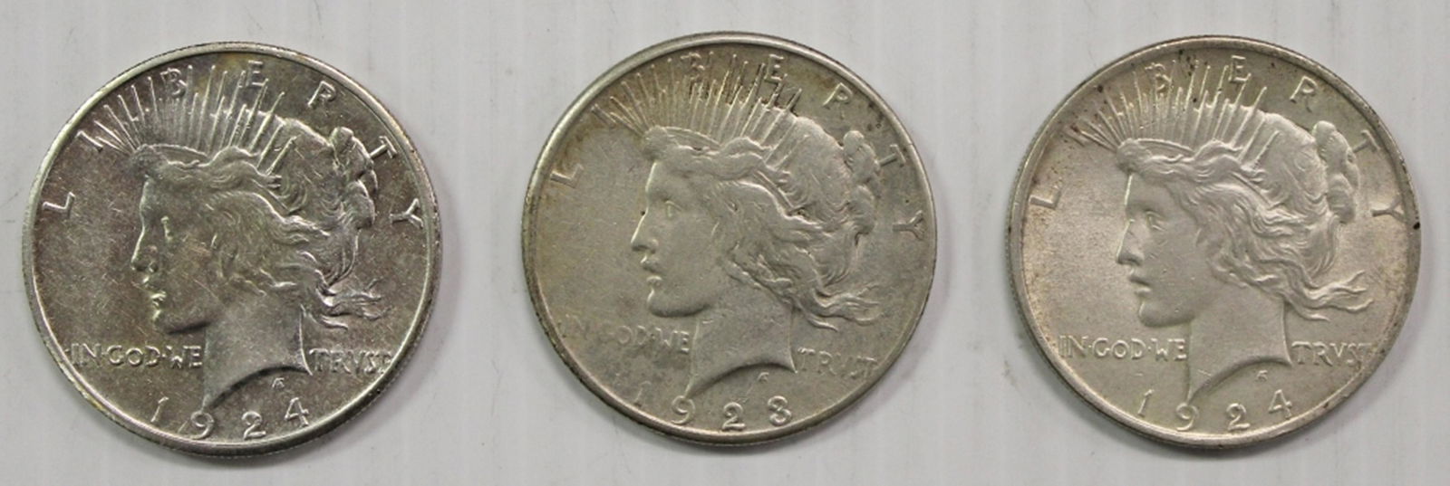 (3) PEACE SILVER DOLLARS (1 of 2)