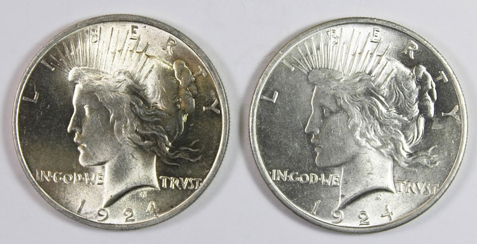 (2) 1924 PEACE SILVER DOLLARS (1 of 2)