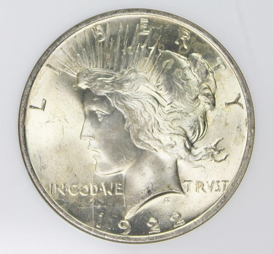 1922 PEACE SILVER DOLLAR: NGC MS 65 GEM. ESTIMATE: $110-$150